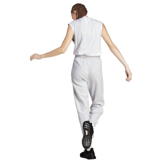 Adidas Γυναικείο παντελόνι φόρμας Essentials 3-Stripes Fleece Loose-Fit Pants Adidas Γυναικείο παντελόνι φόρμας Essentials 3-Stripes Fleece Loose-Fit Pants